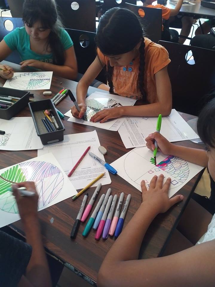 Children working on their art projects at Third Street Community Center