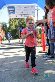 Young girl walking to raise money