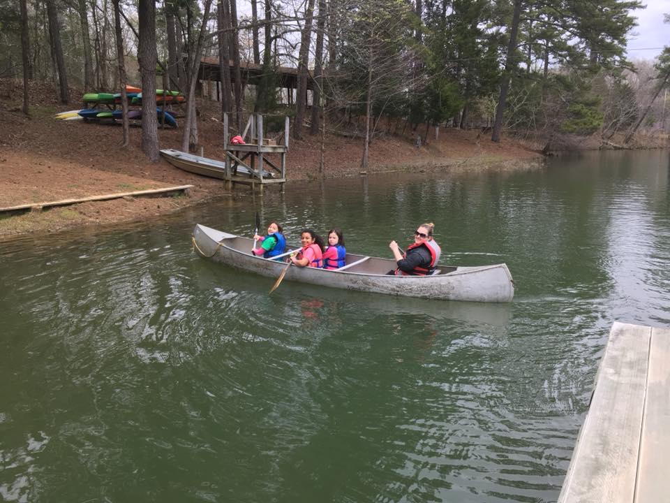 Girl Scouts canoeing