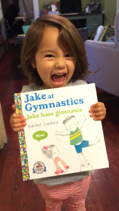Happy child receives brand new book