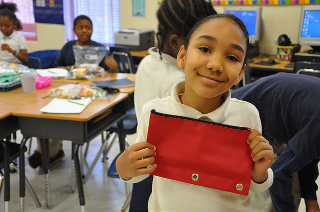 Girl with pencil bag