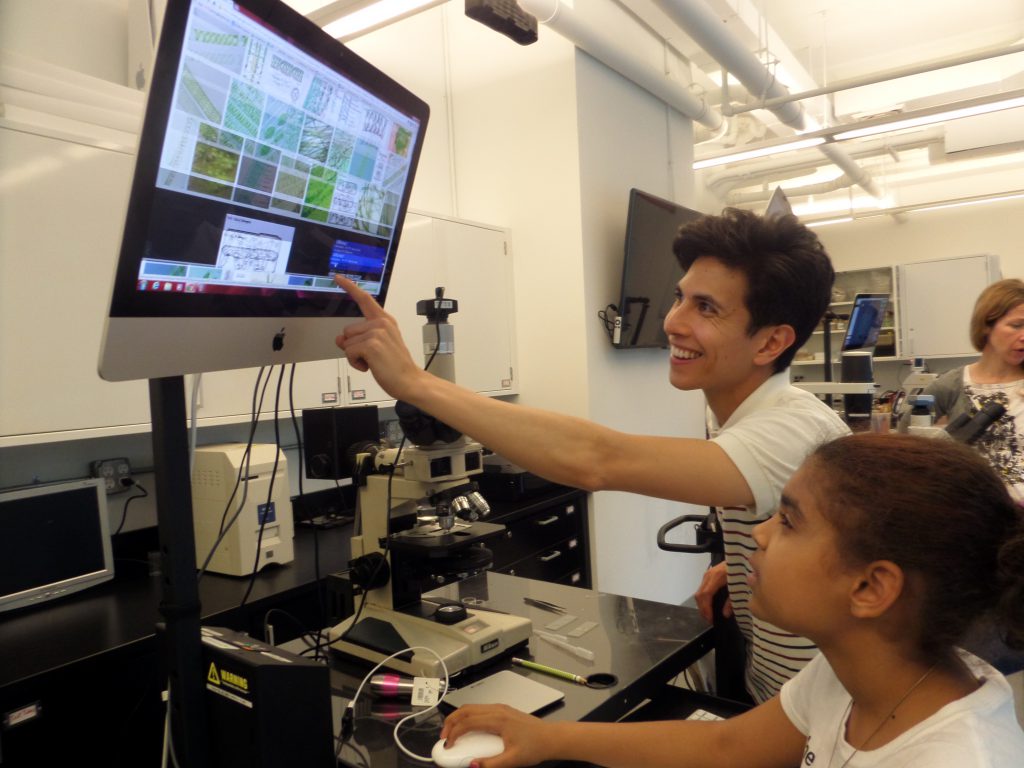 Teacher explains science to young charges aboard the BioBus