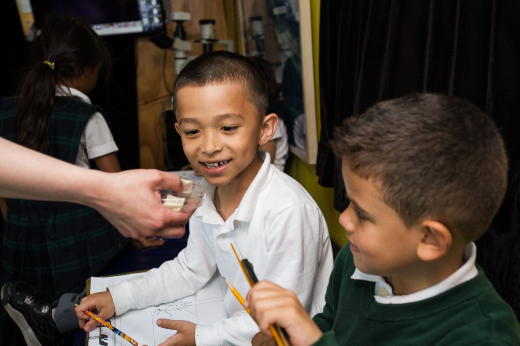 Students enjoying science aboard BioBus