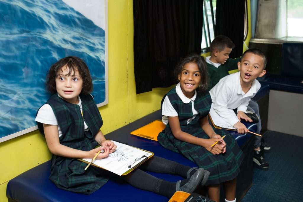 Young children enjoying science aboard BioBus