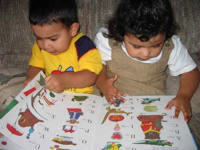 Two Children with ABC Book (Parent-Child Home Program)