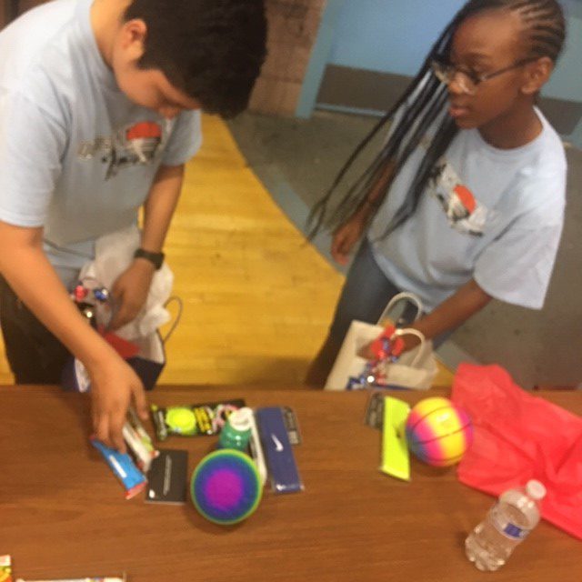 Out of School program participants play a game