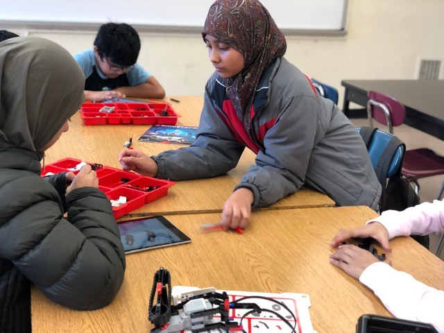 Young girls learn robotics at Elite Learners, Inc.