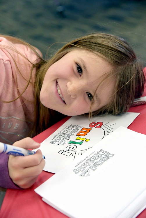 Raising Kindness participant at an event