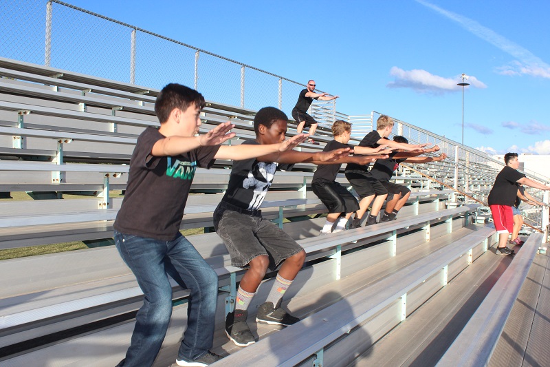 M.E.S.A. Program bleacher squats