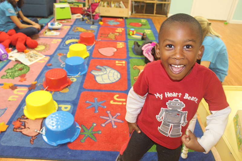 Child having fun at a Playtime Project playroom