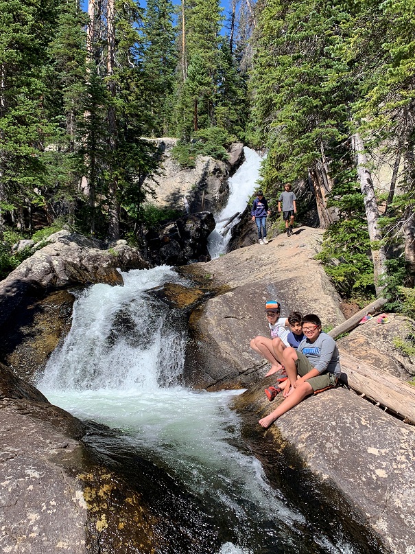 Mile High 360 students enjoy an outing to a waterfall