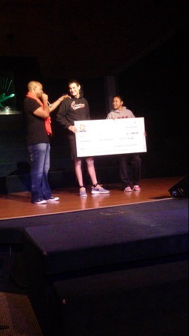 Presenting a scholarship check to a deserving student
