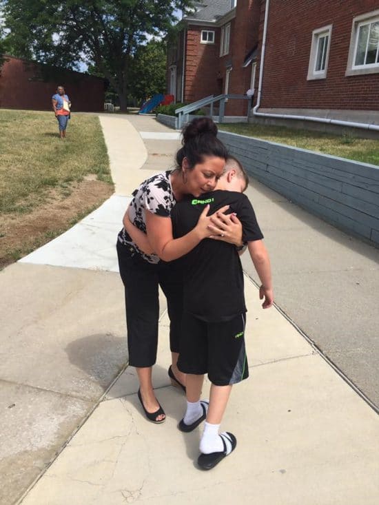 Whaley Children's Center resident gets a hug
