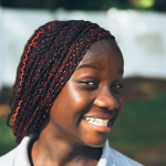 Smiling young black woman