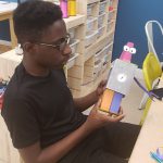 Maverick Landing Community Services resident Jimmy and his robot