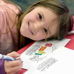 Raising Kindness participant at an event