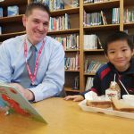 Inspiring Minds volunteer and student share a Power Lunch.