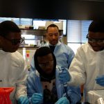 Future Kings participants in the lab