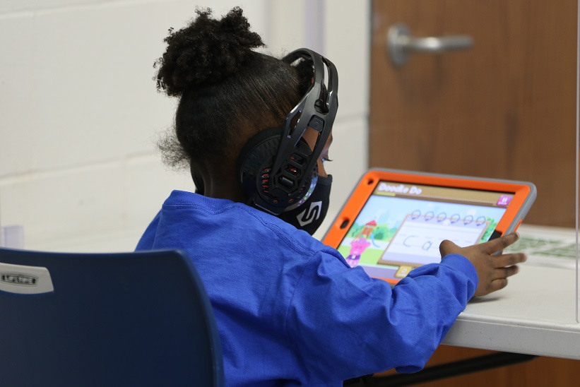 A student uses Mighty Doodle to learn to read, write, and spell