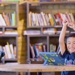 Happy student takes a mobility break from learning
