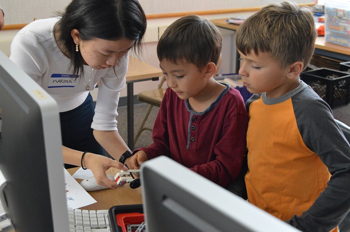 Showing children the finer points of robotics during a Robotics for All session