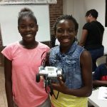 STEAMsport supports females in STEAM. These two students show their pride in building their first robot 6_15