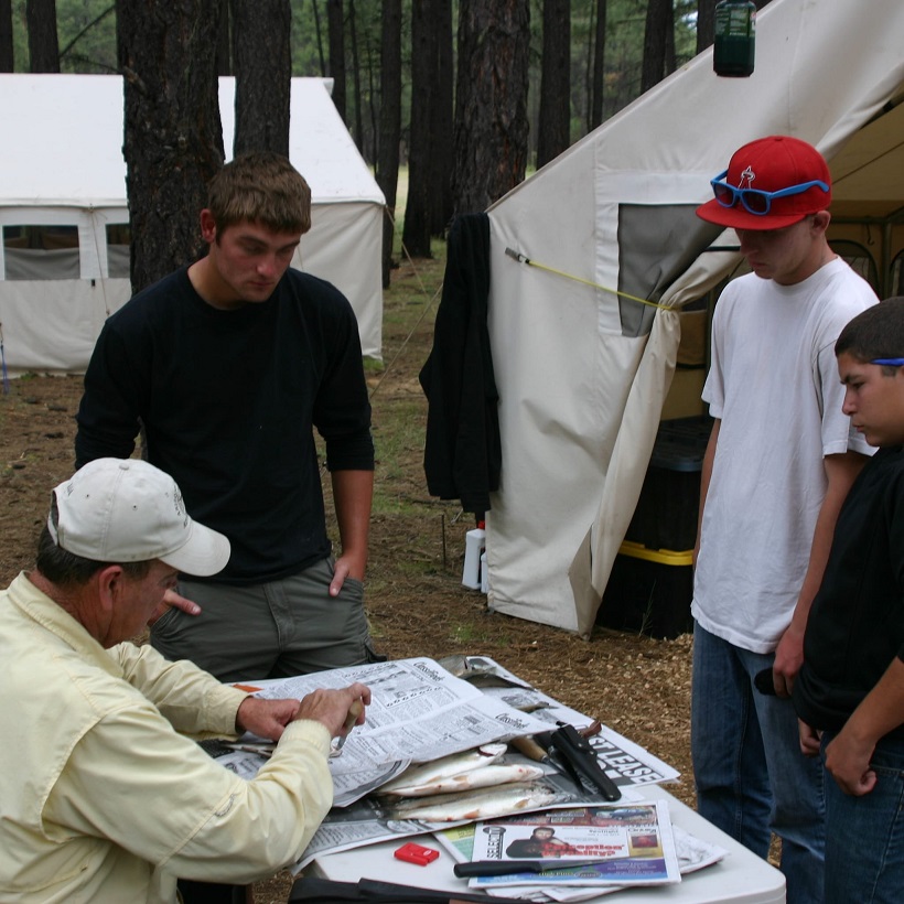 A lesson in cleaning fish at Arizona Outdoor Adventures