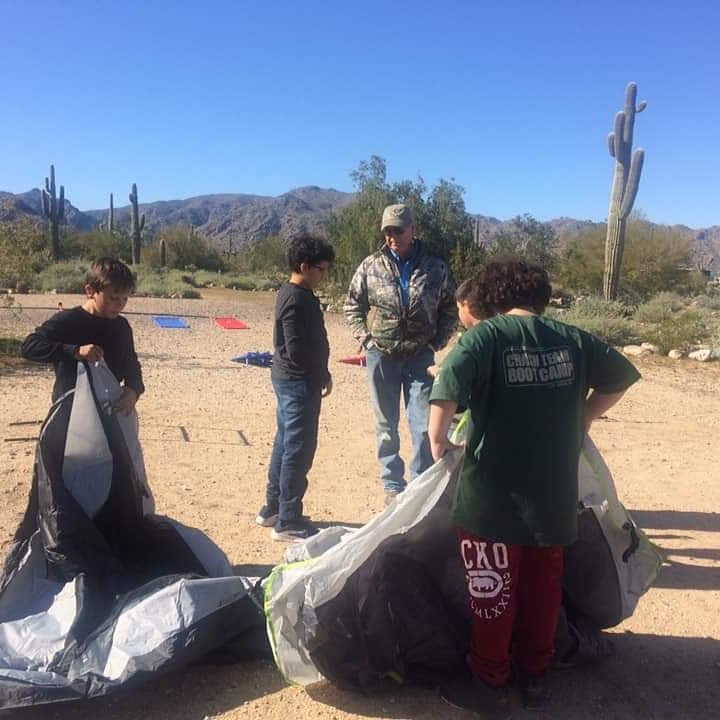 Setting up tents in the desert