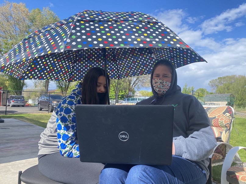 Friends of the Children--Klamath Basin mentor and mentee do homework out of doors during the pandemic