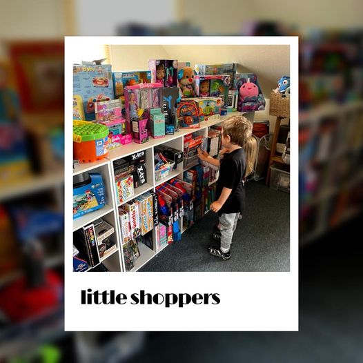 Foster Hearts' Foster Closet store with two young shoppers