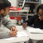 tutor works with higher achievement scholar