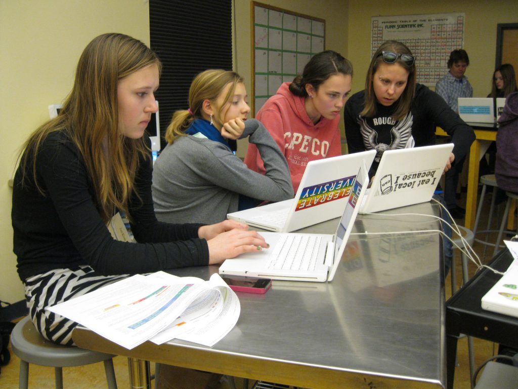 Code Savvy students completely engrossed in computer science work