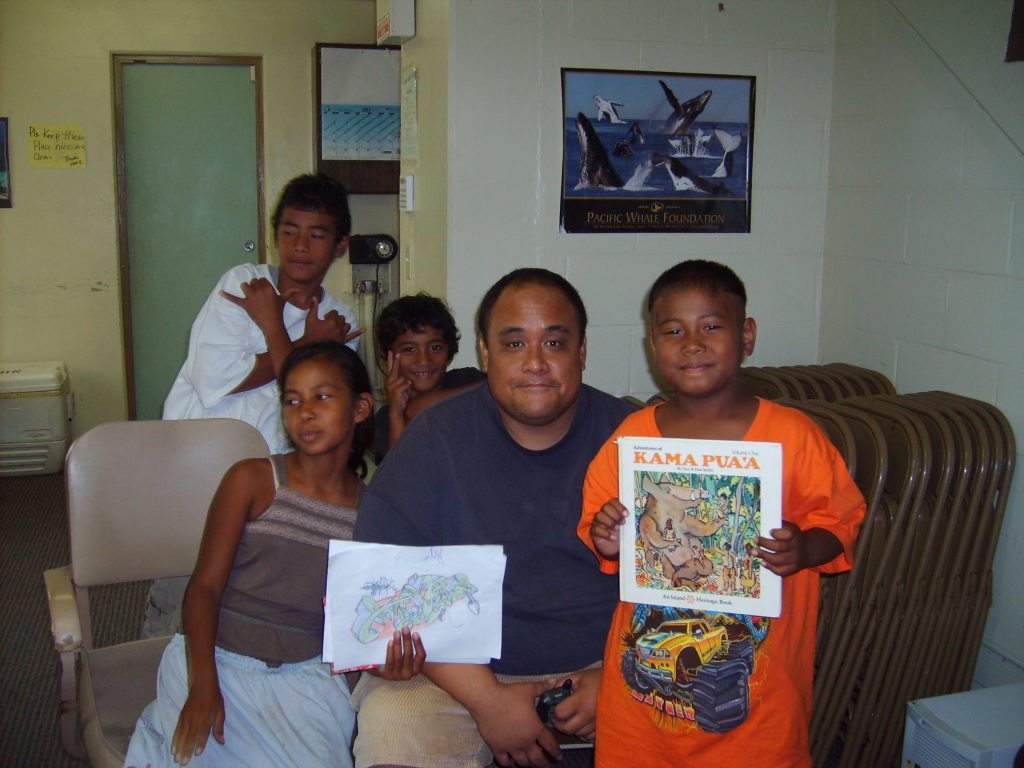 Uncle Scott volunteers with children at Hawaii Literacy