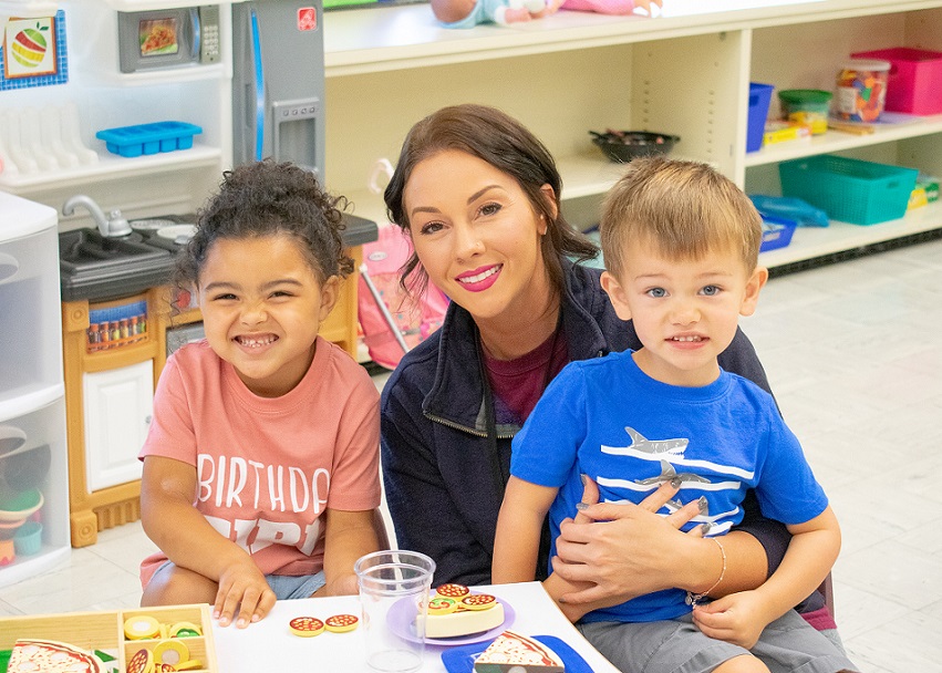 Preschool children and teacher at The Learning Lamp