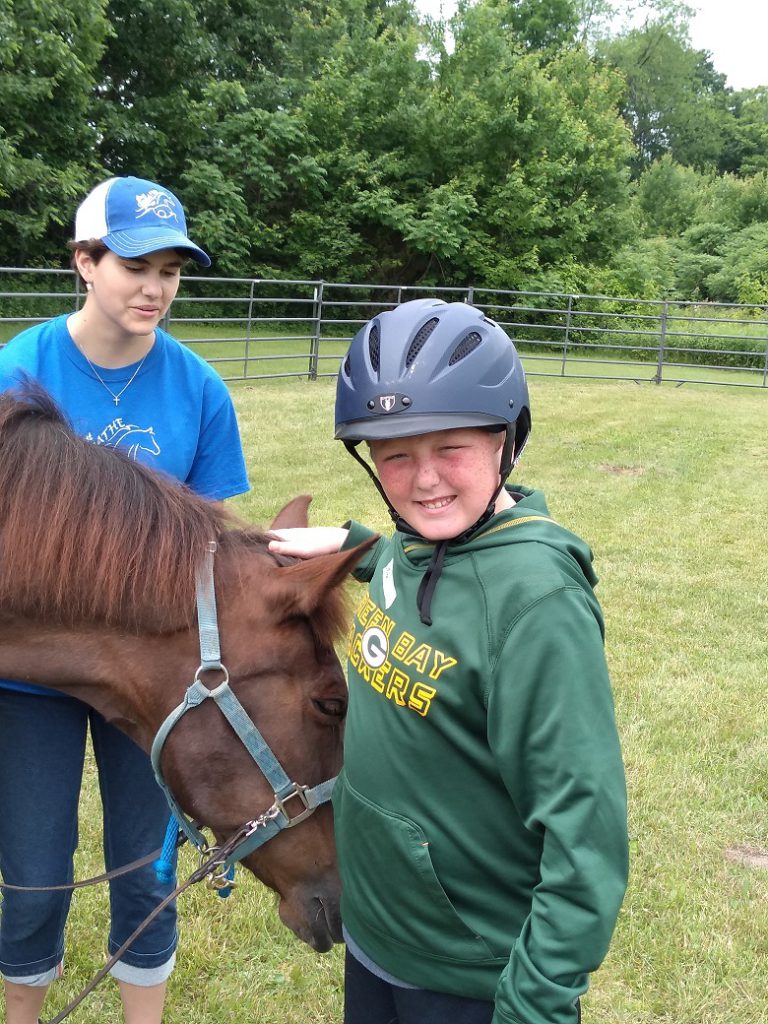 Kids Ranch Inc. youth enjoy some healing equine therapy