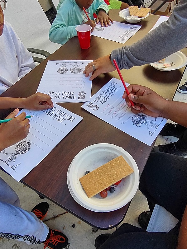 Homework and a snack at Community Education Partnerships