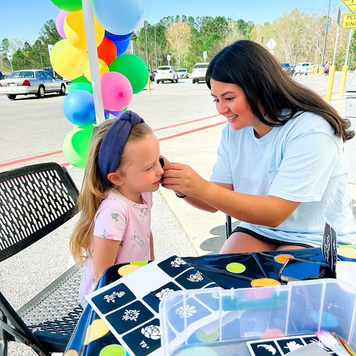 Junior auxiliary of meridian member with child