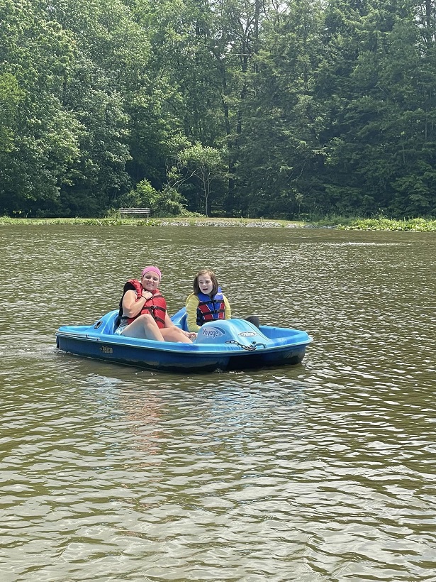 camper, volunteer, paddle boat, camp cranium