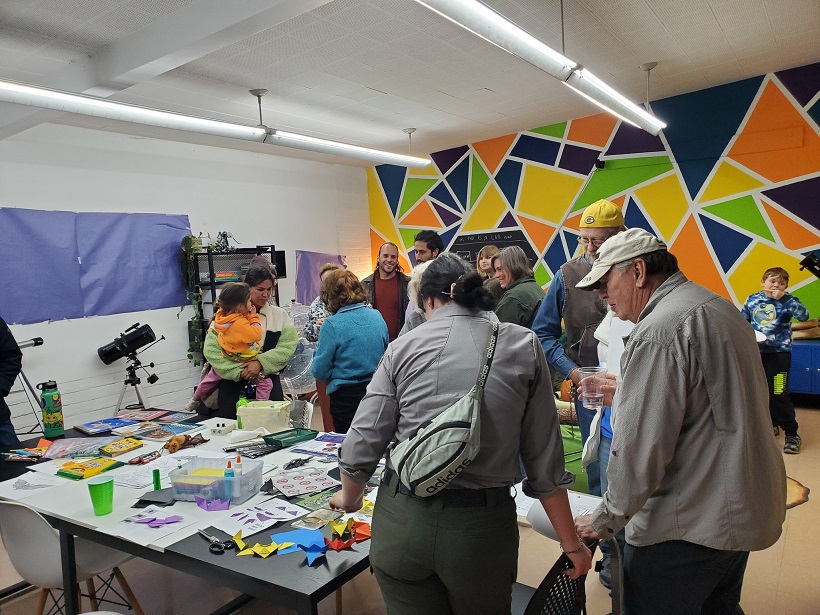 parents look at art supplies bisbee