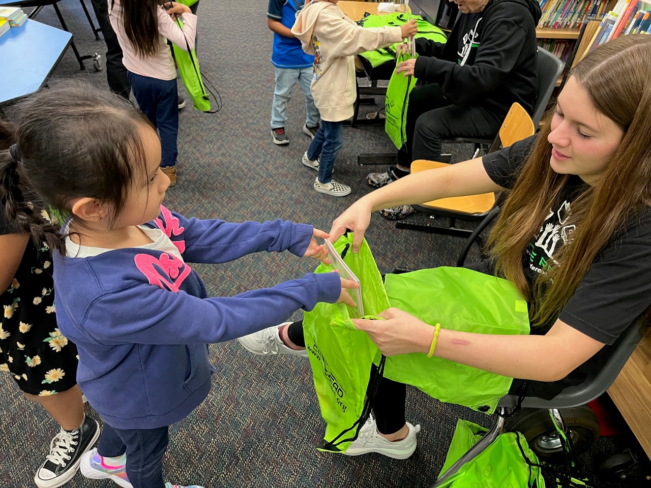 Krestul sister packs book bag