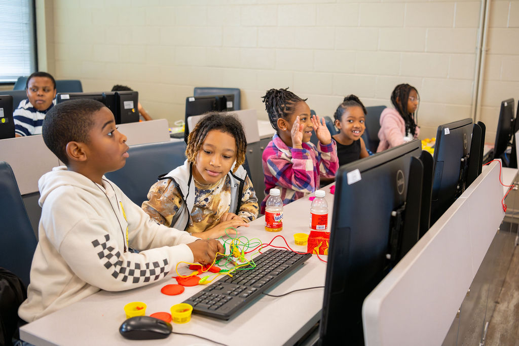 CodeCrew students, surprised boy