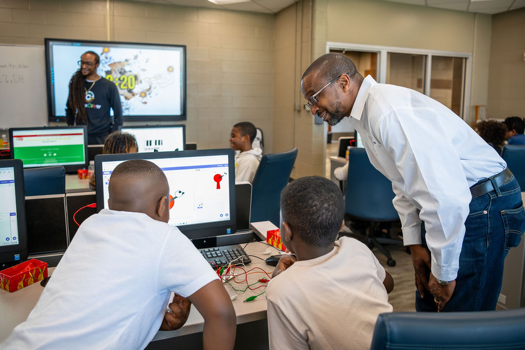 CodeCrew teacher and students at computer