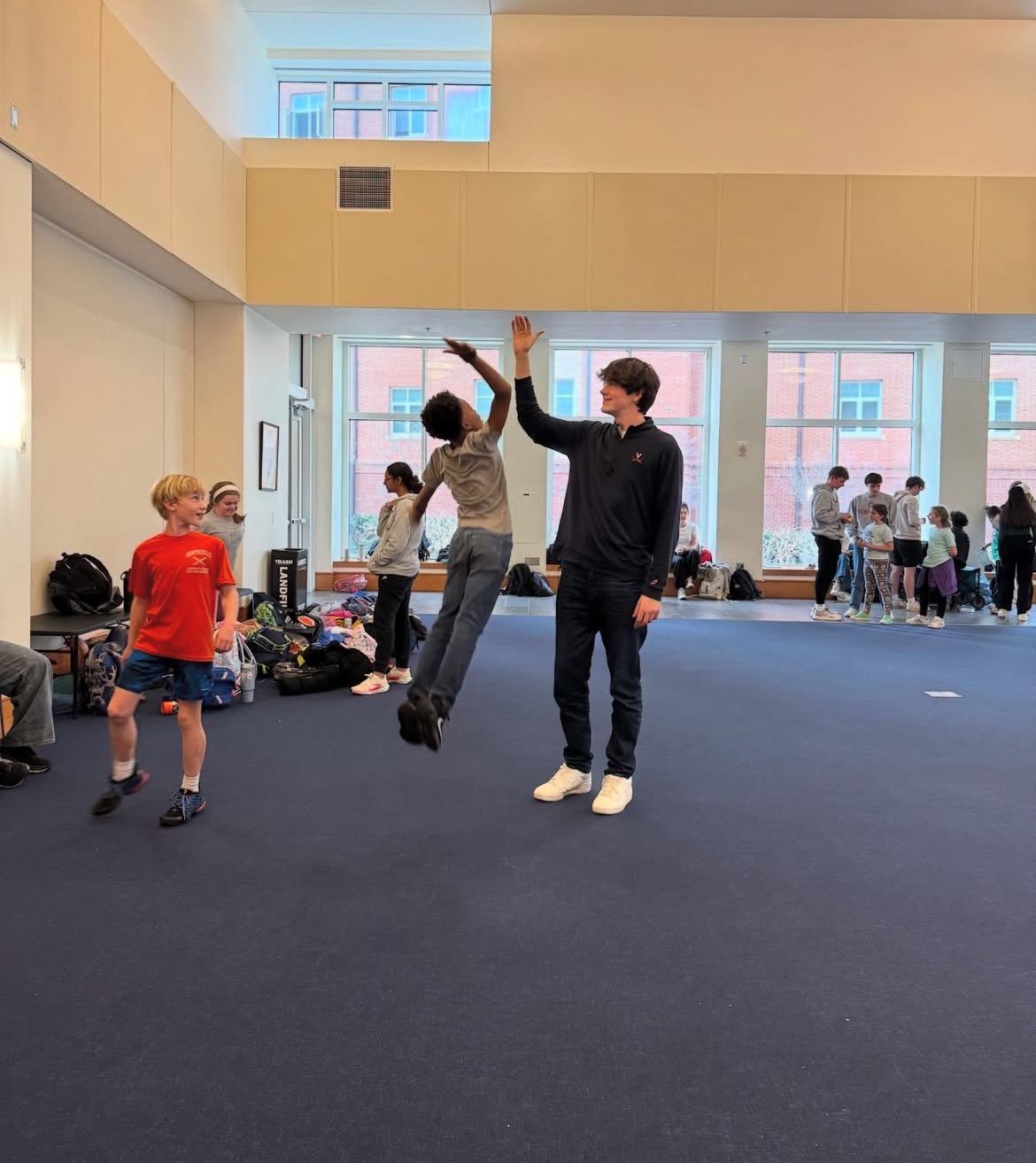 College Mentors for Kids mentee slaps mentor five.