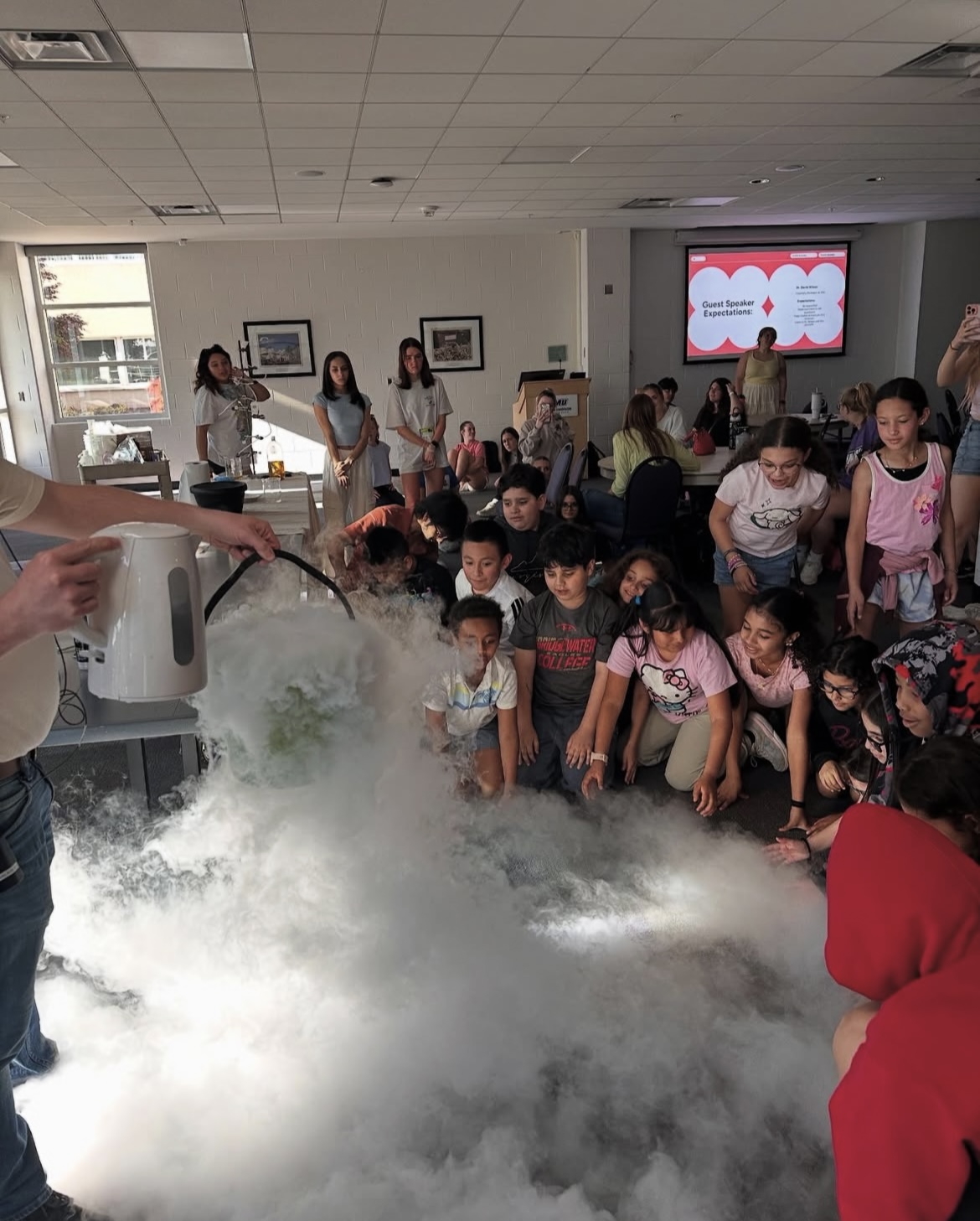 College Mentors for Kids participants enjoy science experiment