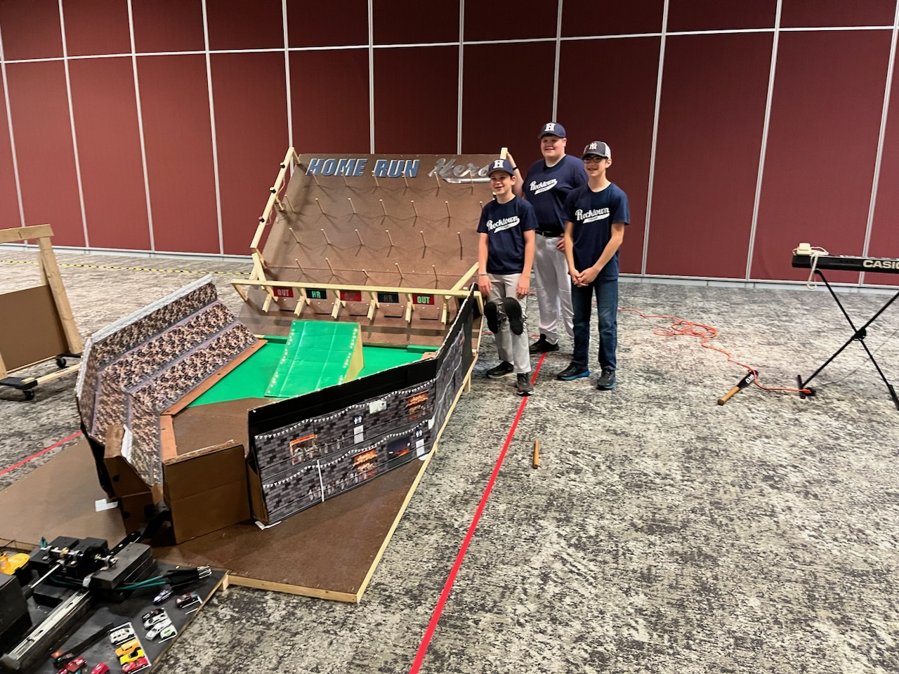 Destination Imagination Virginia participants with their baseball solution