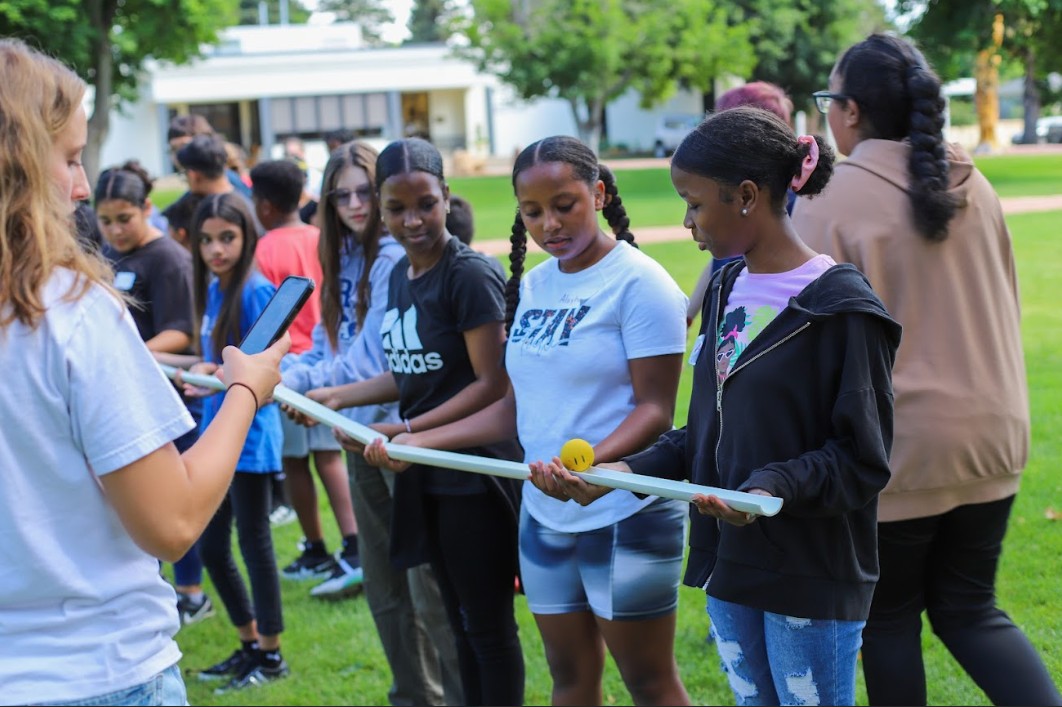Peak Education girls engage in Rube Goldberg type activity