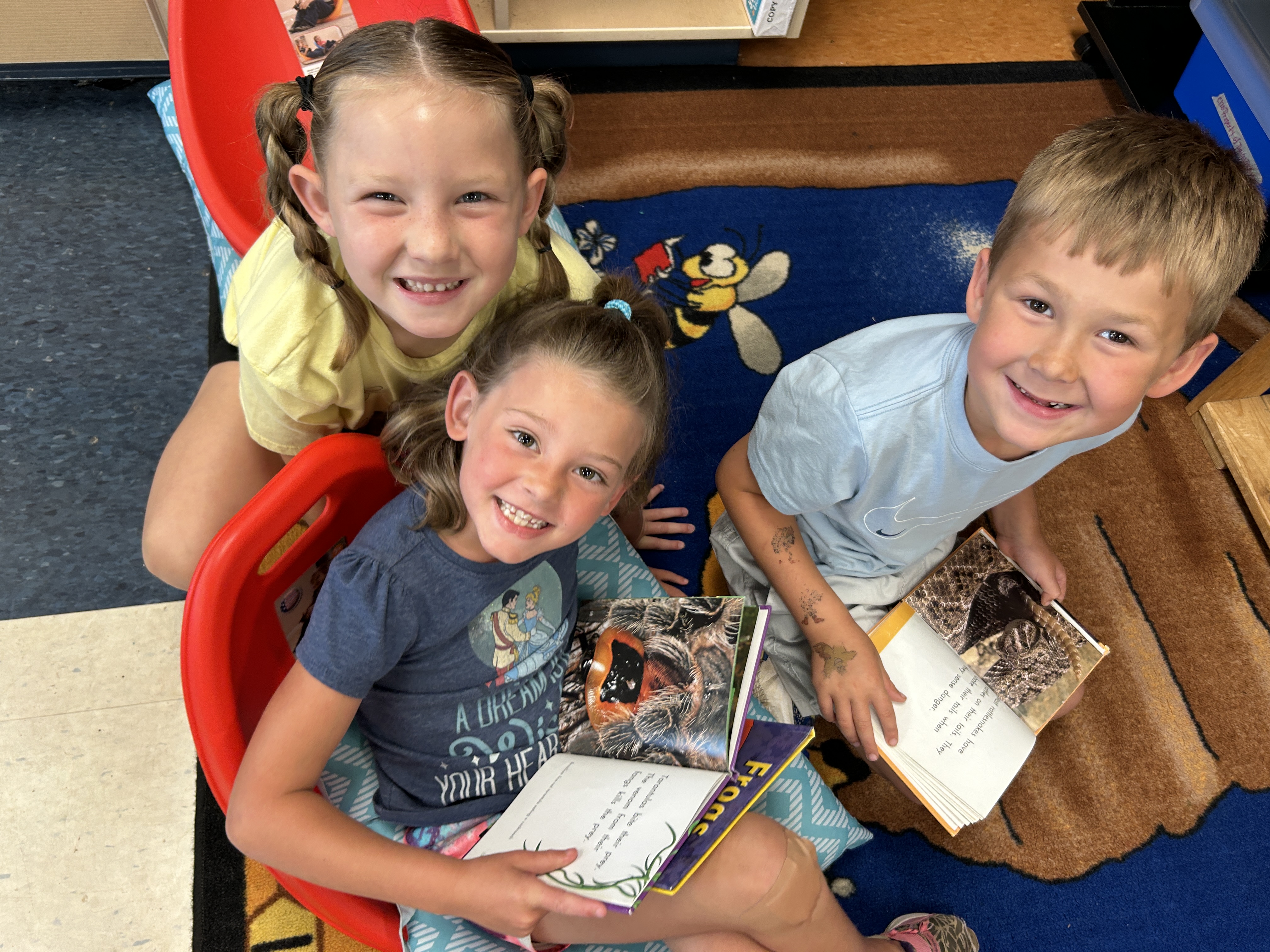 United Way of Pickens County participants with smiles, holding books