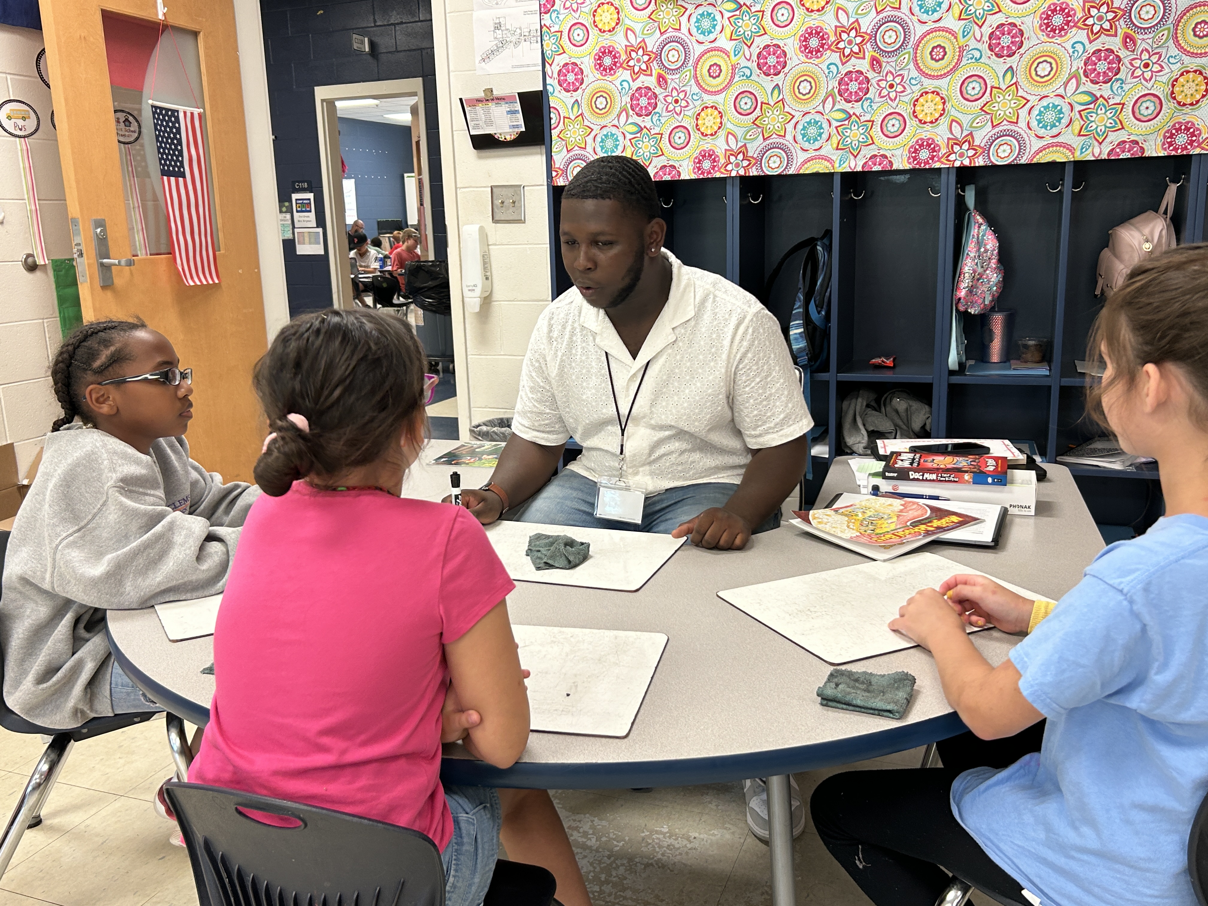 Teacher works with students on literacy skills at United Way of Pickens County