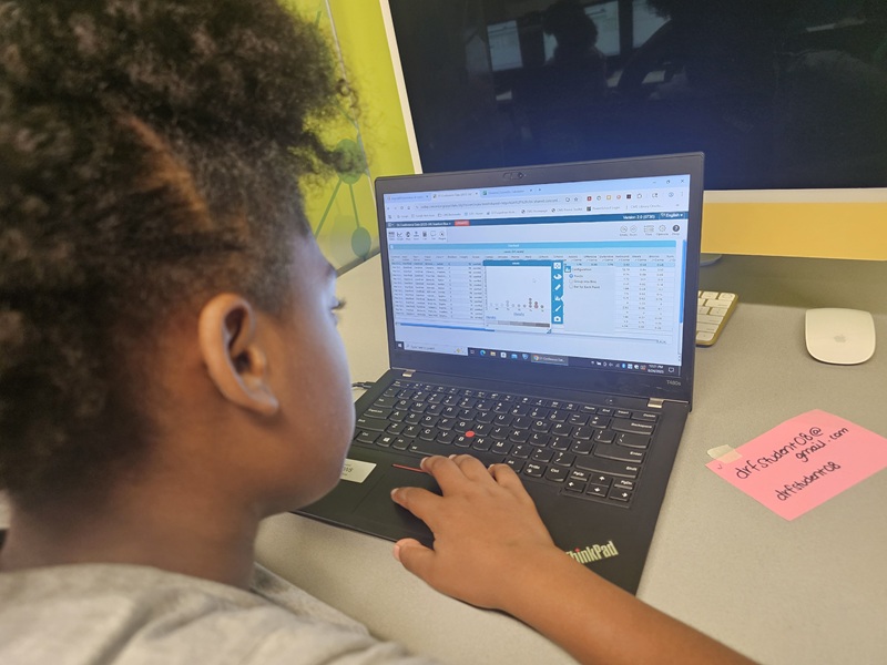 Dottie Rose Foundation participant works on tablet