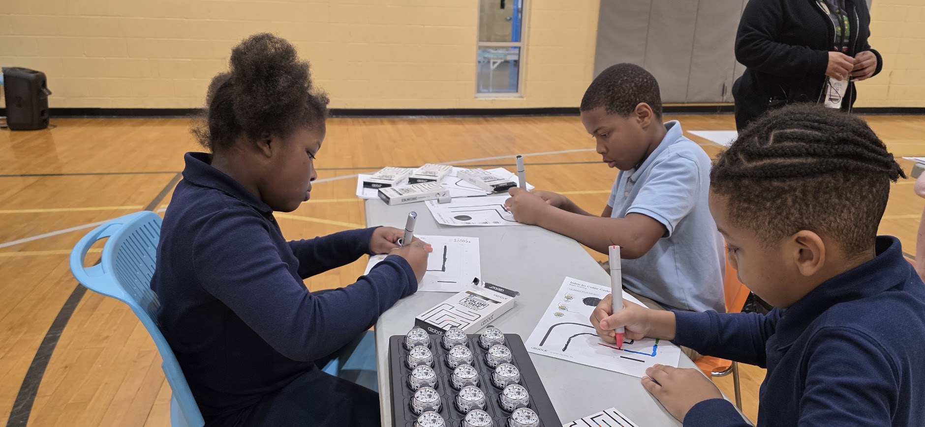 Focus and persistence: Students concentrate on structured STEM activities that build foundational problem-solving and computational thinking skills.
